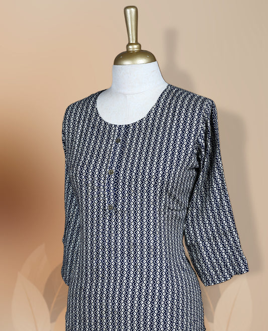 Navy blue colour kurthi adorned with delicate cream colour floral prints, featuring a round neckline and three quarter sleeves & Crafted for comfort and style, perfect for casual and semi formal occasions.