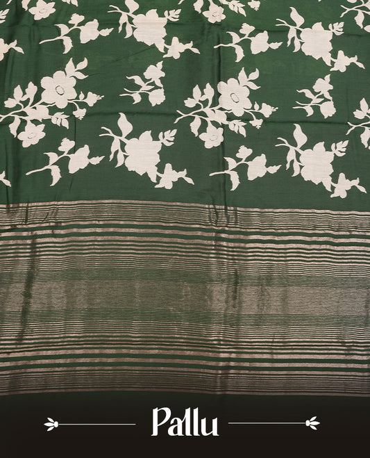 Green colour Viscos semi printed saree featuring a light golden zari border, abstract off white printed motifs on the body, and comes with a matching blouse