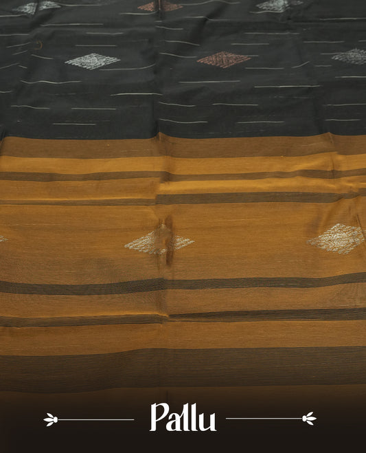 Black Cotton Saree with Silver and Bronze/Copper Diamond Butta Body, Featuring Gold/Mustard Zari-Accented Pallu with Scalloped Border Edge, Paired with Matching Gold/Mustard Plain Blouse Piece