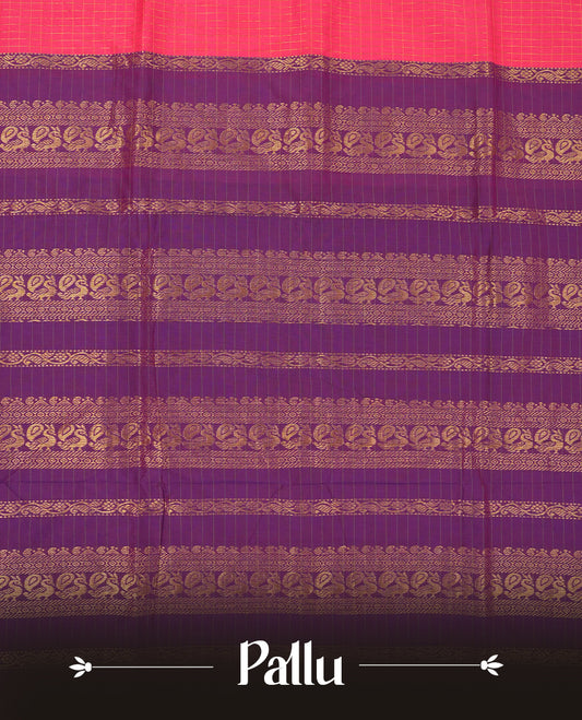 bright pink coloured mixed Kalyani cotton saree featuring golden zari checks on the body, complemented by a Dark Purple coloured border and pallu adorned with golden zari patterns, Paired with a matching blouse.
