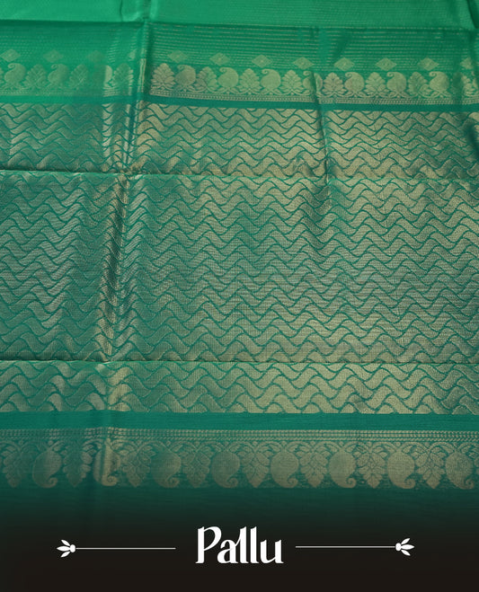 Aqua Green colour pure handloom cotton saree featuring fine golden stripes with delicate motifs, paired with a rich zari blue border for a traditional yet elegant look, perfect for graceful occasions & Comes with matching blouse.