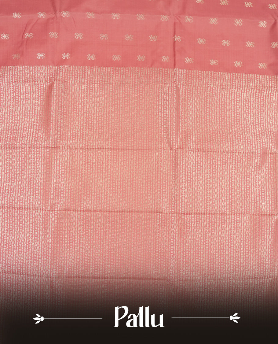 Dusty rose colour semi soft silk saree featuring a golden textured patterned body, complemented by self coloured golden zari motifes on pallu & border and a matching blouse piece.