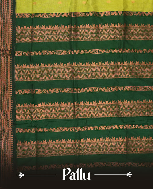 Lemon Green colour Kalyani Cotton saree with copper motifs, paired with a contrasting green border featuring intricate zari work & Comes with a matching blouse piece.