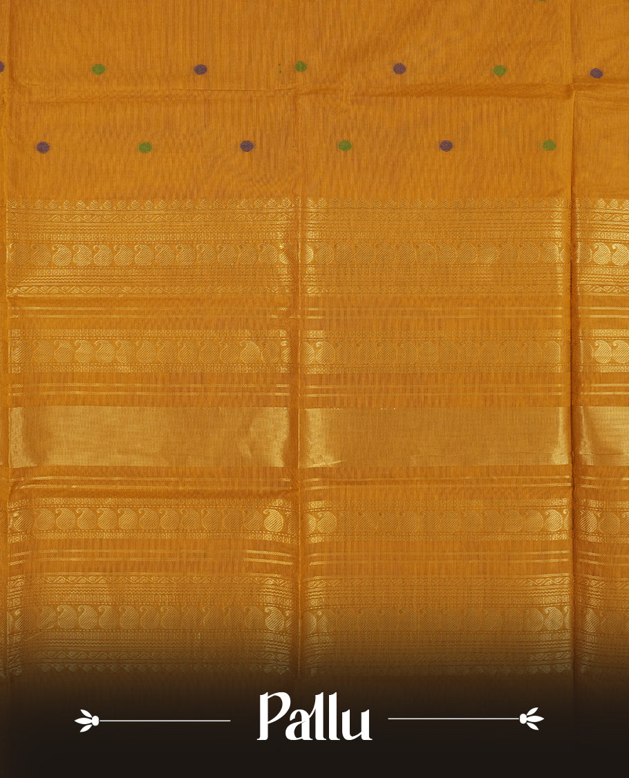 Brown & Purple colour dual shaded Chettinad cotton saree adorned with small woven dots on the body, a striking purple and green border with intricate golden zari patterns and geometric motifs & Comes with a matching blouse piece.