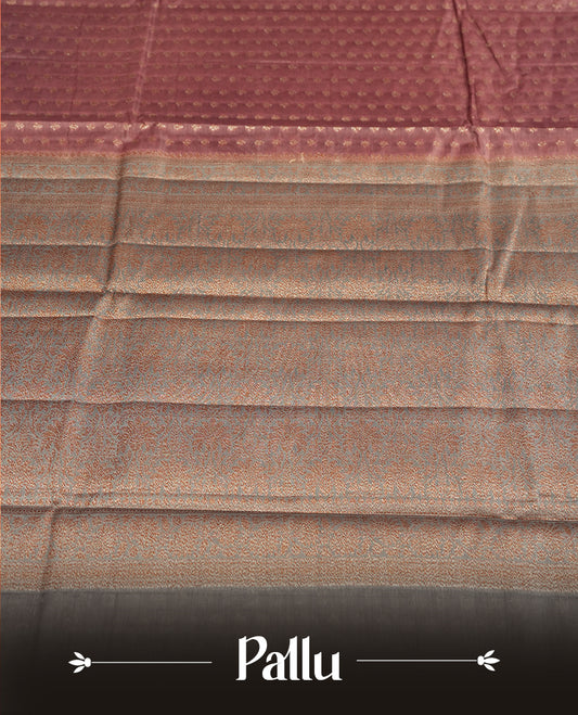 Mauve colour Pure Banarasi Tussar Saree , featuring intricate zari motifs, contrast grey colour traditional border, woven pallu, and matching blouse.
