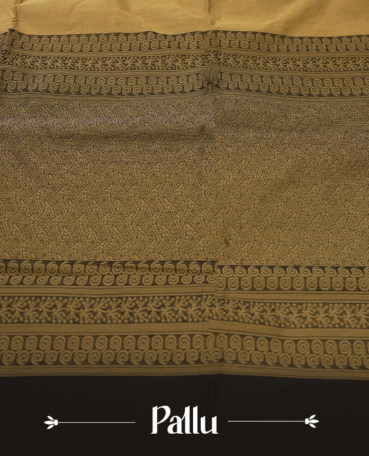 Beige colour soft silk cotton saree adorned with motifs and Enhanced by a beautifully rich black colour woven contrasted pallu & Comes with a matching blouse piece for a complete look.