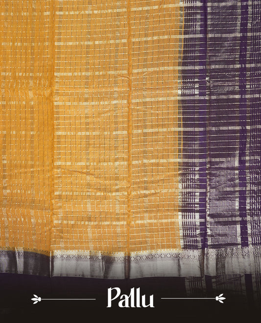 Mustard yellow colour mixed chanderi cotton saree with checkered body, deep purple pallu with rose gold zari border, and matching purple blouse.
