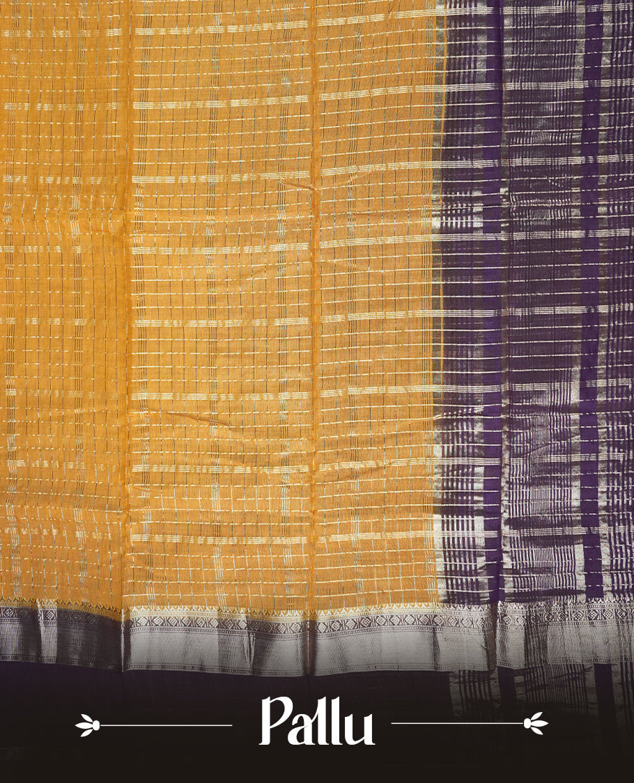 Mustard yellow colour mixed chanderi cotton saree with checkered body, deep purple pallu with rose gold zari border, and matching purple blouse.