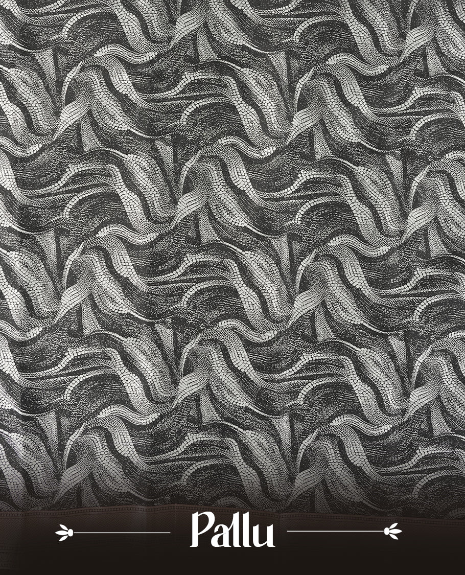 Black colour semi silk saree featuring elegant circular motifs on the body, complemented by white wavy designed pallu with striking border adorned with intricate golden thread patterns,and paired with a matching blouse