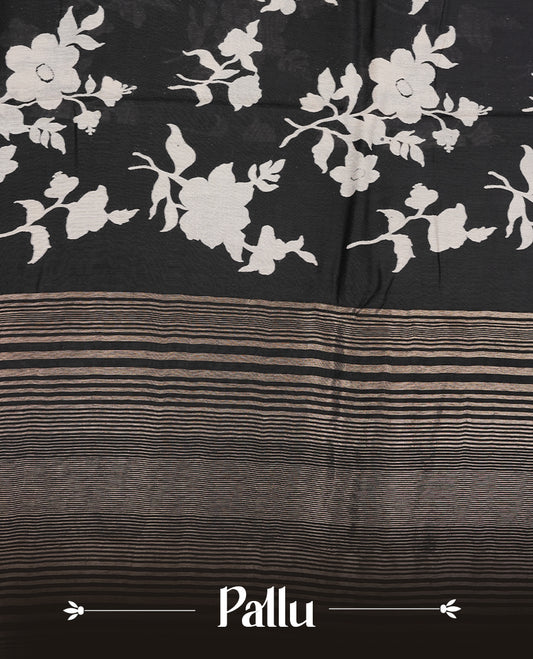 Black colour Viscos semi printed saree featuring a light golden zari border, abstract off white printed motifs on the body, and comes with a matching blouse