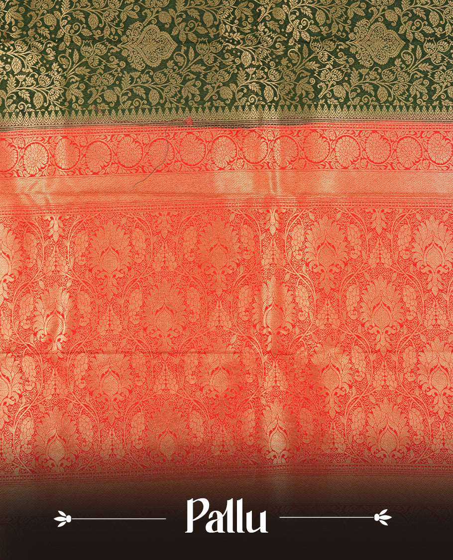 Dark green colour semi silk brocade saree featuring intricate Gold floral kodi patterns across the body, complemented by a contrast rich red colour woven border and pallu, paired with a matching blouse.
