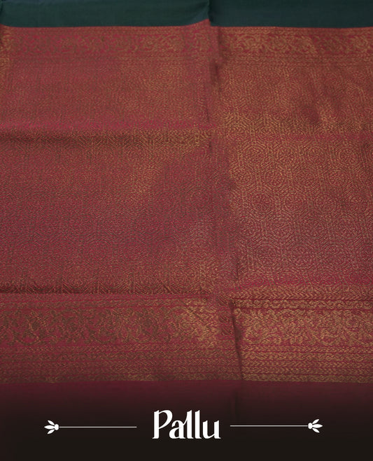 Deep greeen colour soft silk cotton saree adorned with copper zari motifs and a shimmering copper zari border, Enhanced by a beautifully rich maroon colour woven pallu & Comes with a matching blouse piece for a complete look.