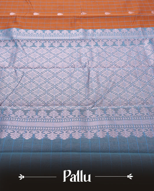 Orange Silk Cotton Saree with White Floral Buttas Body, Accented by White Lotus and Geometric Pattern on Green and Blue Zari Pallu, Paired with Matching Blouse Piece