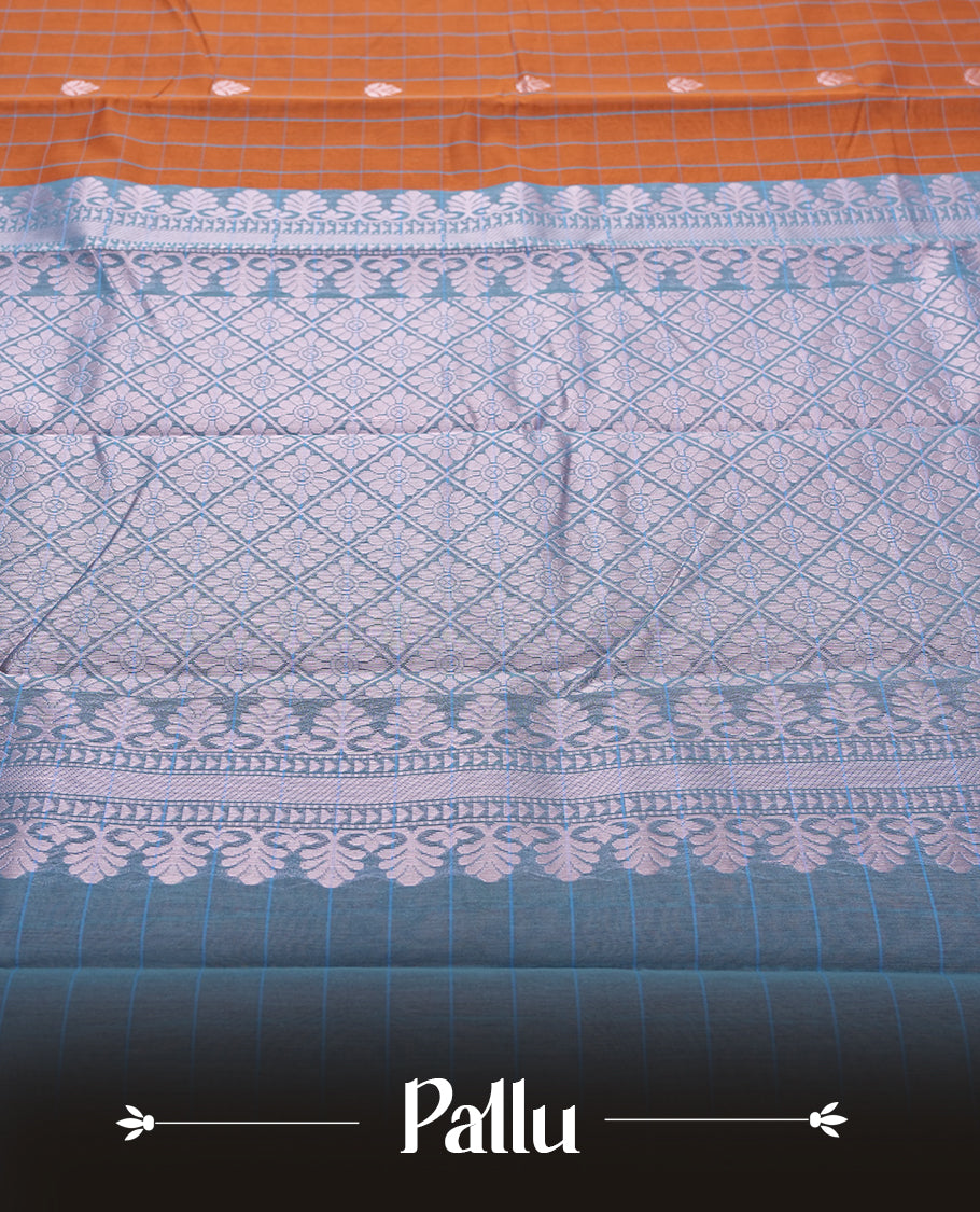 Orange Silk Cotton Saree with White Floral Buttas Body, Accented by White Lotus and Geometric Pattern on Green and Blue Zari Pallu, Paired with Matching Blouse Piece