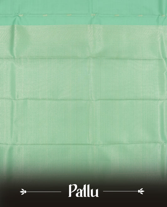 Light aqua colour semi soft silk saree featuring a gold patterned body, complemented by Gold colour traditional pallu and a matching blouse piece.