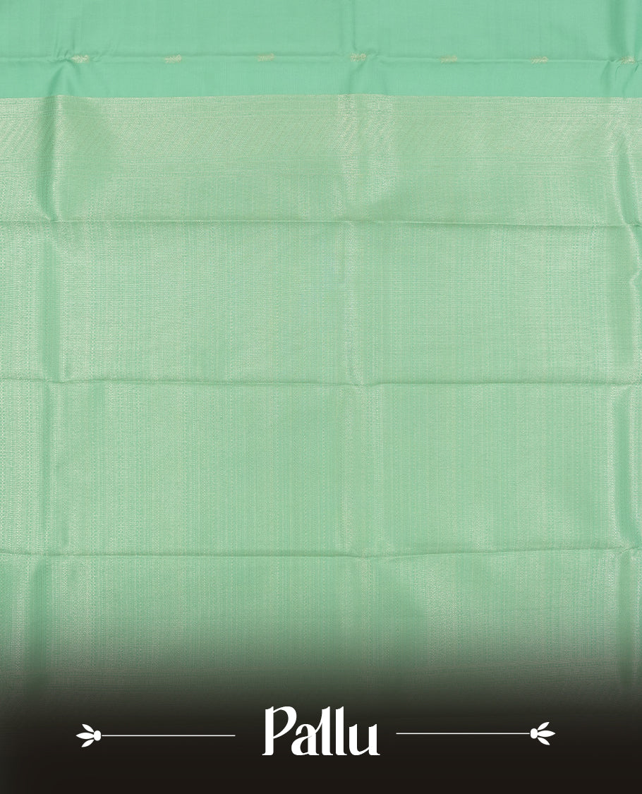 Light aqua colour semi soft silk saree featuring a gold patterned body, complemented by Gold colour traditional pallu and a matching blouse piece.