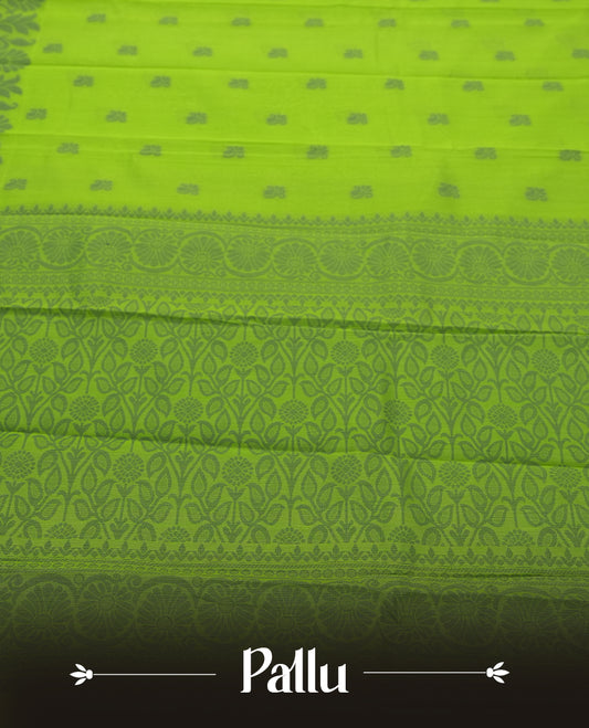 Lemon green colour silk cotton saree featuring elegant floral zari motifs on the body, complemented by a rich contrast dark border and pallu with traditional woven detailing & Comes with a matching blouse piece.