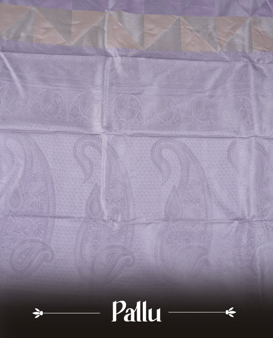 Lavender & cream colour semi soft silk saree featuring a silver zari patterned body, complemented by silver zari motifes on pallu & border and a matching blouse piece.