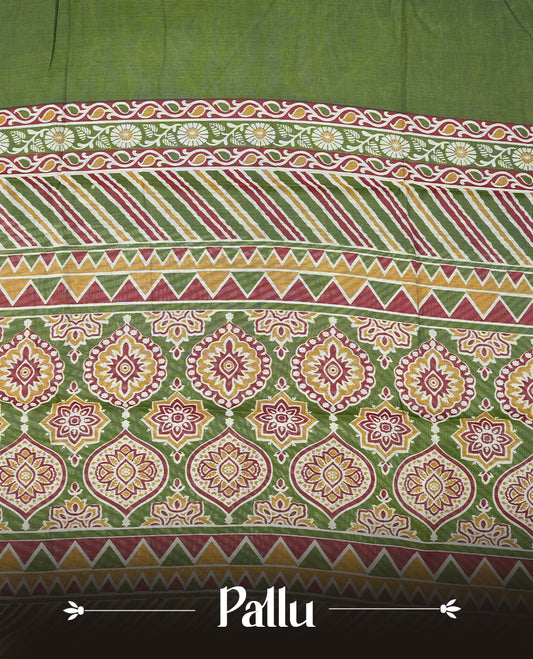 Olive green colour chanderi cotton saree featuring plain body, multicoloured printed geometric border with diagonal stripes, zigzag and floral motifs, golden zari border, and matching striped blouse.