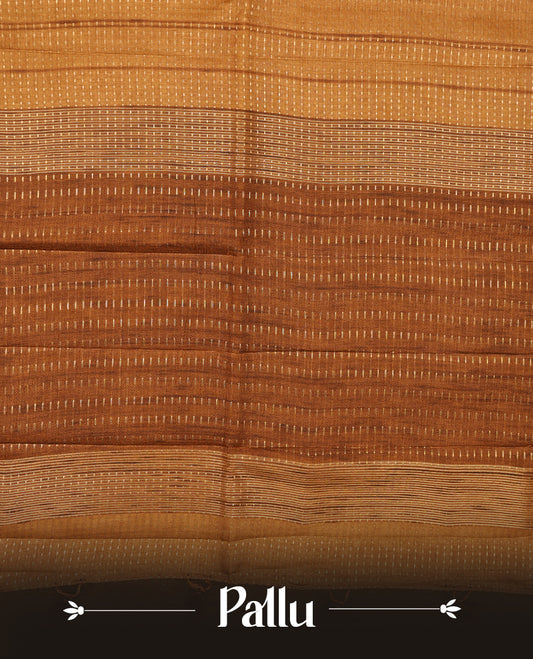 Antique gold colour chettinad saree highlighting gold zari dotted stripes, self colour border and contrast dark gold pallu and comes with matching blouse piece.