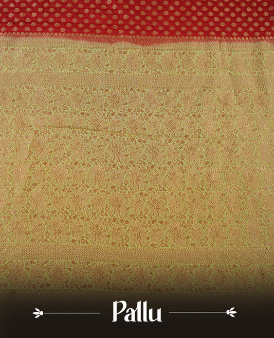 Maroon colour pure Banarasi Crepe saree featuring Antique zari Flower Motifs all over the body, complemented by an contrast Light green dye colour with gold zari Floral Kodi Worked border and pallu, with matching blouse.