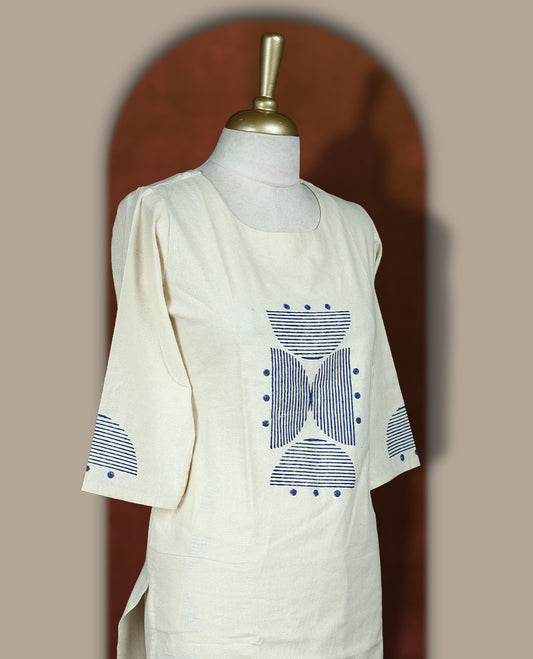 Cream colour cotton co-ord set featuring with navy geometric prints and polka dots & comes with matching bottom.