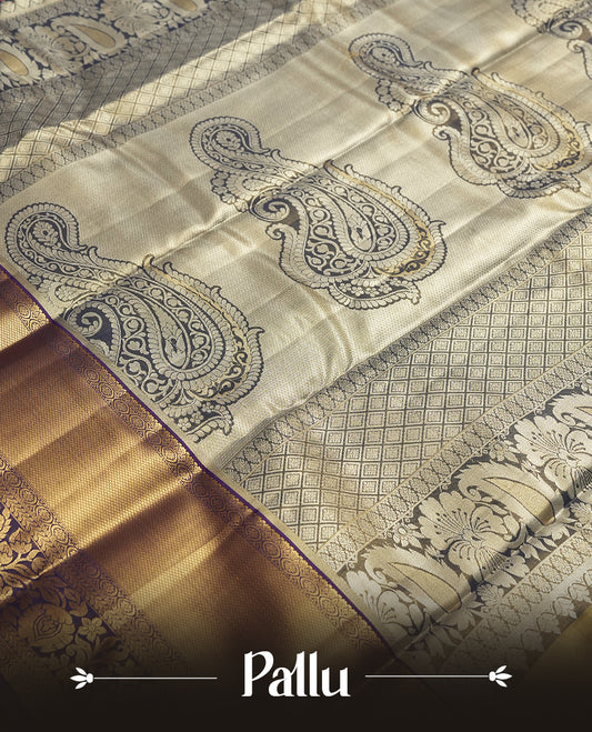 Golden colour and Antique silver Zari Tissue Brocade Saree features intricate a coloured floral Motifs on body and traditional border & pallu with floral patterns, paired with matching blouse