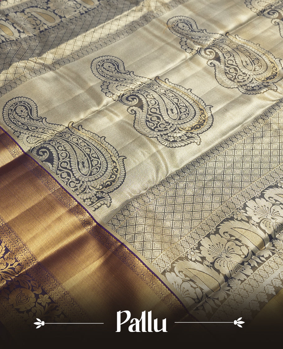 Golden colour and Antique silver Zari Tissue Brocade Saree features intricate a coloured floral Motifs on body and traditional border & pallu with floral patterns, paired with matching blouse