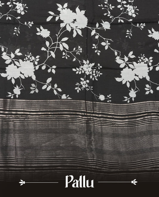 Black colour Viscos semi printed saree featuring a light golden zari border, abstract white printed motifs on the body, and comes with a matching blouse