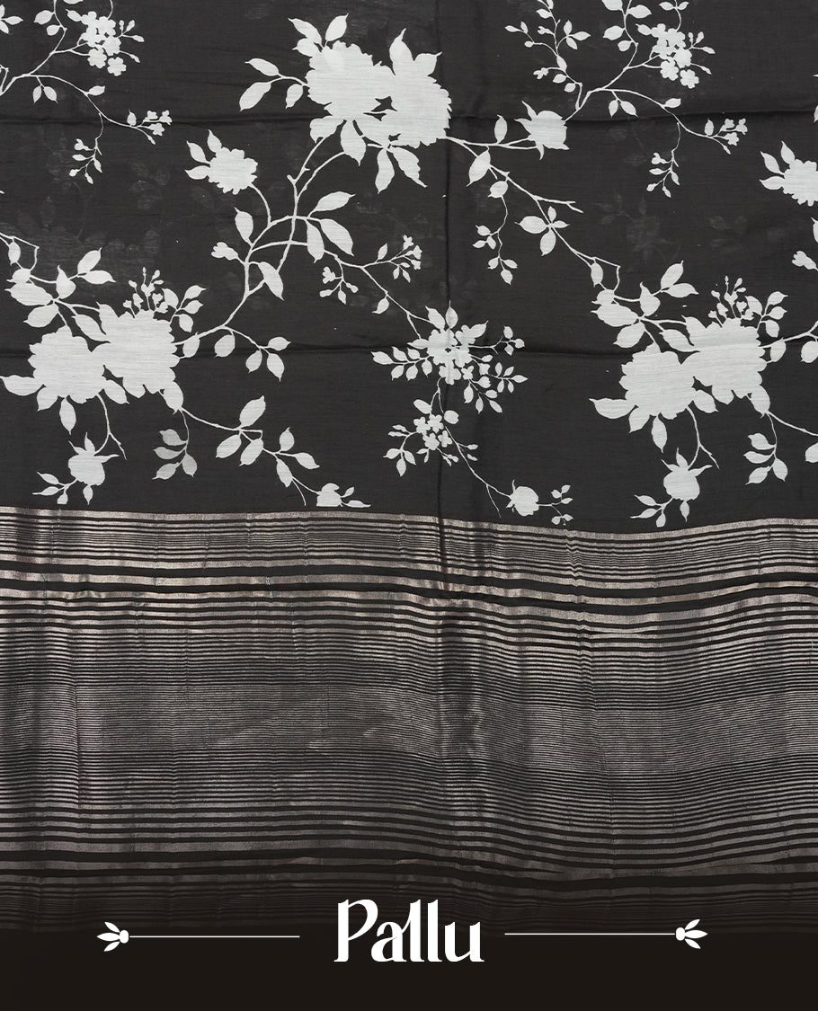 Black colour Viscos semi printed saree featuring a light golden zari border, abstract white printed motifs on the body, and comes with a matching blouse