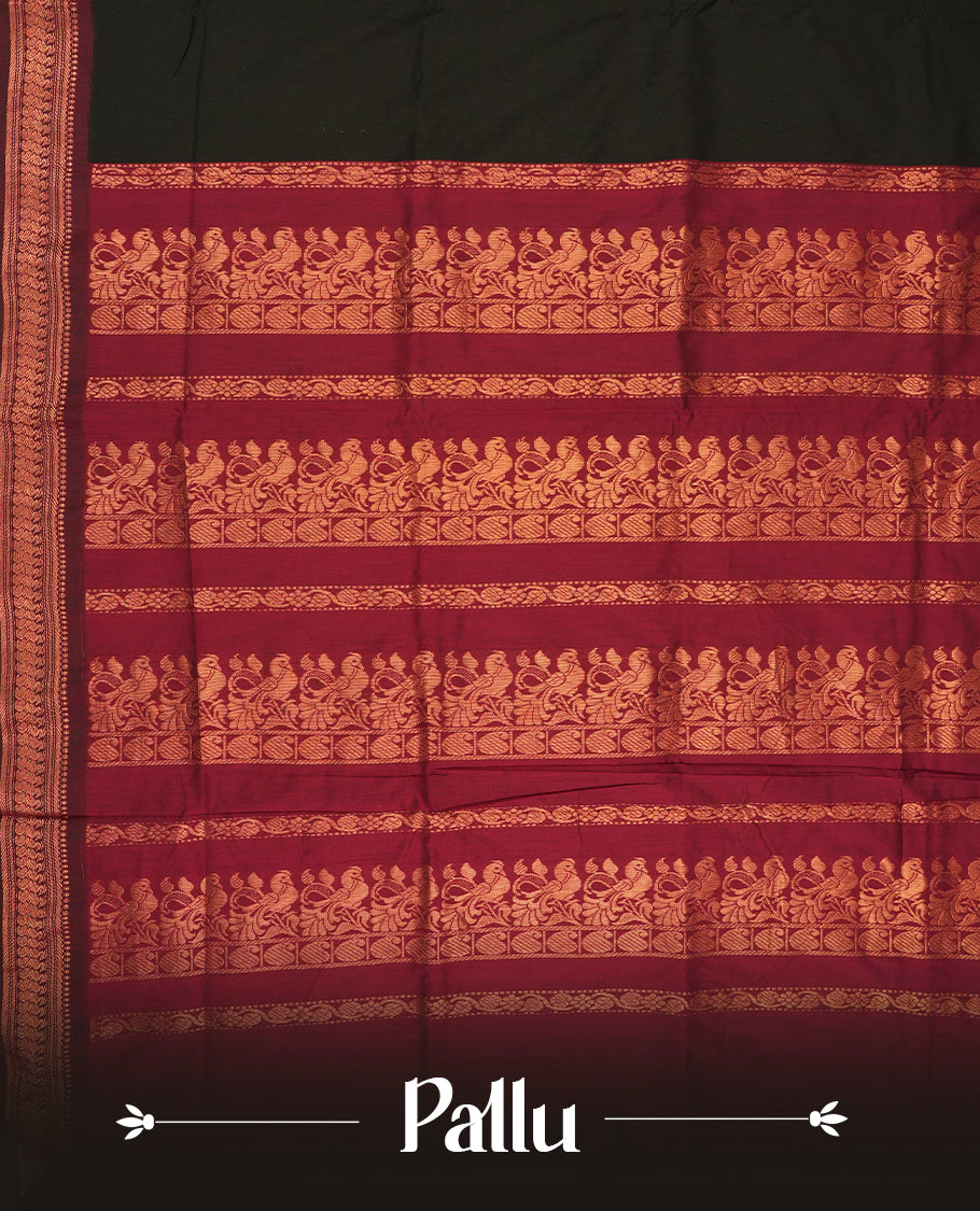 Black colour Kalyani Cotton saree with rich maroon border and pallu, featuring floral copper zari motifs and intricate weaving & includes a matching blouse piece.