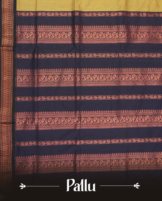 Golden yellow colour Kalyani Cotton saree with subtle zari woven motifs all over, paired with a contrasting deep navy blue rich copper zari border and pallu & Comes with a matching blouse piece.