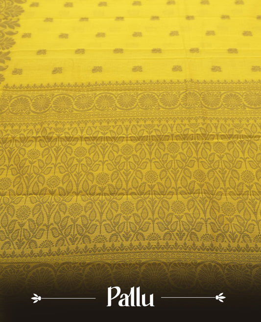 Lemon yellow colour silk cotton saree featuring elegant floral zari motifs on the body, complemented by a rich contrast dark plain border and pallu with traditional woven detailing & Comes with a matching blouse piece.