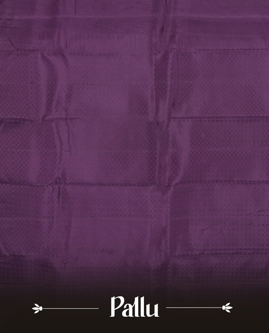 Dark purple  colour semi soft silk saree featuring a self coloured textured patterned body, complemented by self coloured motifes on pallu & border and a matching blouse piece.