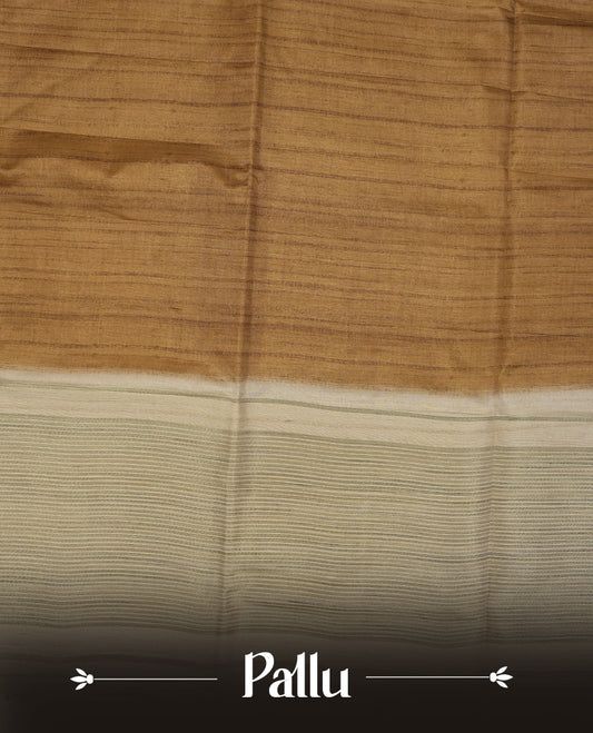 Khaki colour semi tusser silk saree featuring contrast cream colour London bridge printed pattern border and paired with matching blouse.