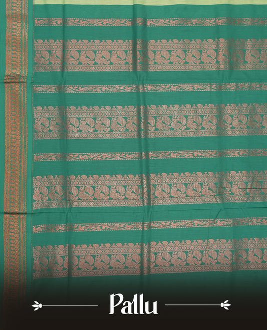 Mint green colour Kalyani cotton saree with subtle zari motifs all over, paired with a contrasting teal green rich copper zari woven border and pallu & Comes with a matching blouse piece.