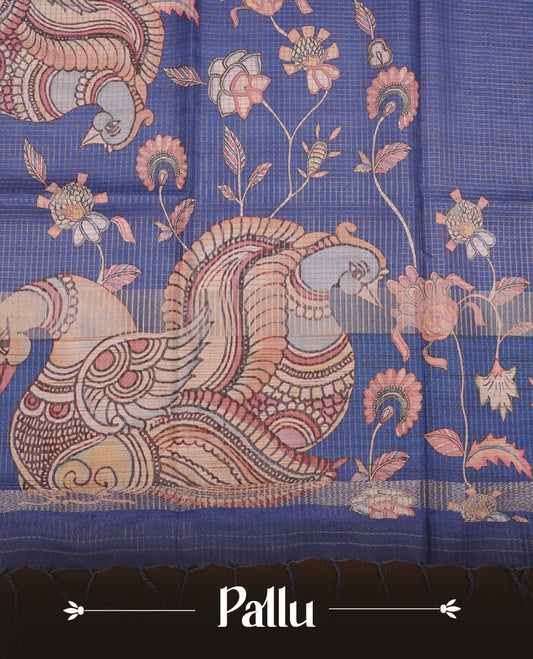 Blue colour semi-tussar silk saree featuring intricate peacock motifs on the pallu, subtle zari check pattern across the body, floral vine prints throughout, finished with tassels and paired with a matching printed blouse piece.