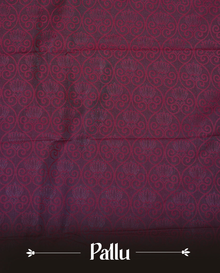 Maroon colour Semi silk saree Featuring selfcolour zari motifs on body, complemented by contrast Green colour with gold zari border, paired with matching blouse piece.
