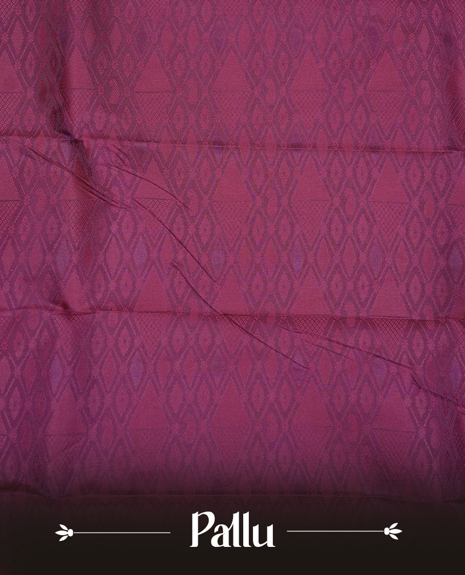 Maroon & gold colour Semi silk saree Featuring self colour zari motifs on body, complemented by contrast burgundy colour with gold zari border, paired with matching blouse piece.