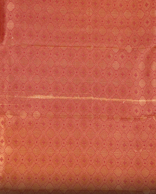 Off white colour Semi silk saree Featuring gold zari motifs on body, complemented by contrast pale orange colour with gold zari border, paired with matching blouse piece.