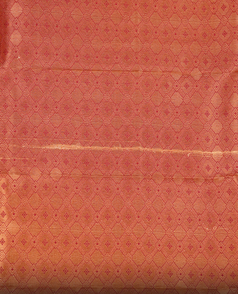 Off white colour Semi silk saree Featuring gold zari motifs on body, complemented by contrast pale orange colour with gold zari border, paired with matching blouse piece.