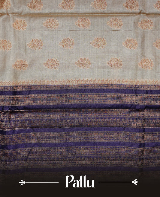 Golden Cream Colour Banaras tussar silk saree featuring Antique zari Motifs on body, Complemented by Violet colour variant with zari border, paired with matching blouse Piece.