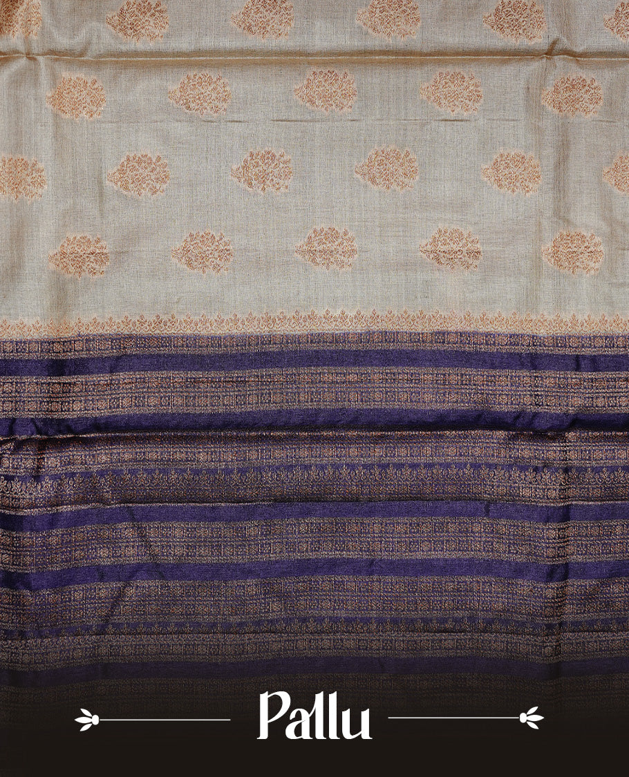 Golden Cream Colour Banaras tussar silk saree featuring Antique zari Motifs on body, Complemented by Violet colour variant with zari border, paired with matching blouse Piece.