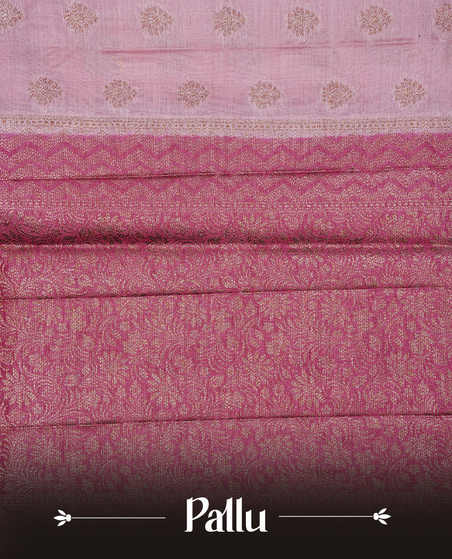 Pink Colour Tussar silk saree featuring Antique Zari motifs on body, Finished with contrast Magenta colour Zigzag zari pattern border, paired with matching blouse piece.