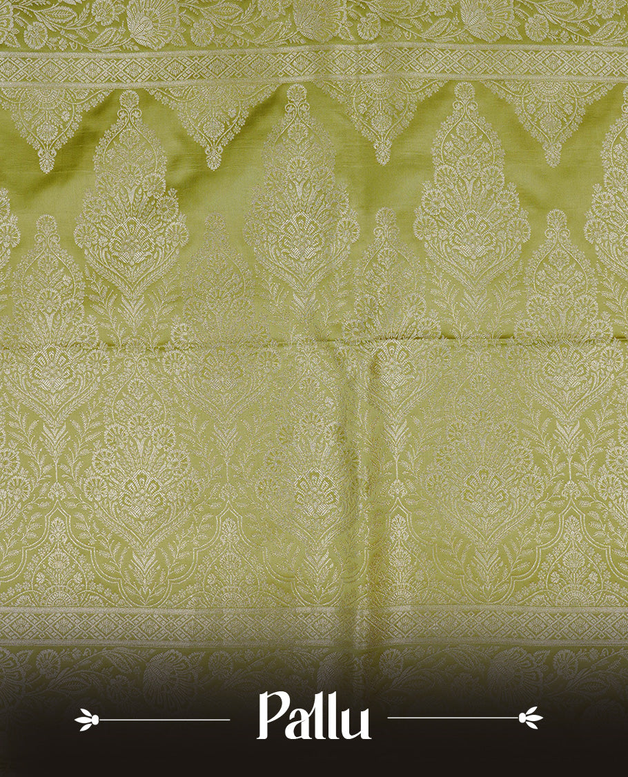 Olive colour Mulberry silk saree featuring light gold small buttas & big motifs onbody, complemented by self colour with Light gold zari floral Border, comes with matching blouse piece.