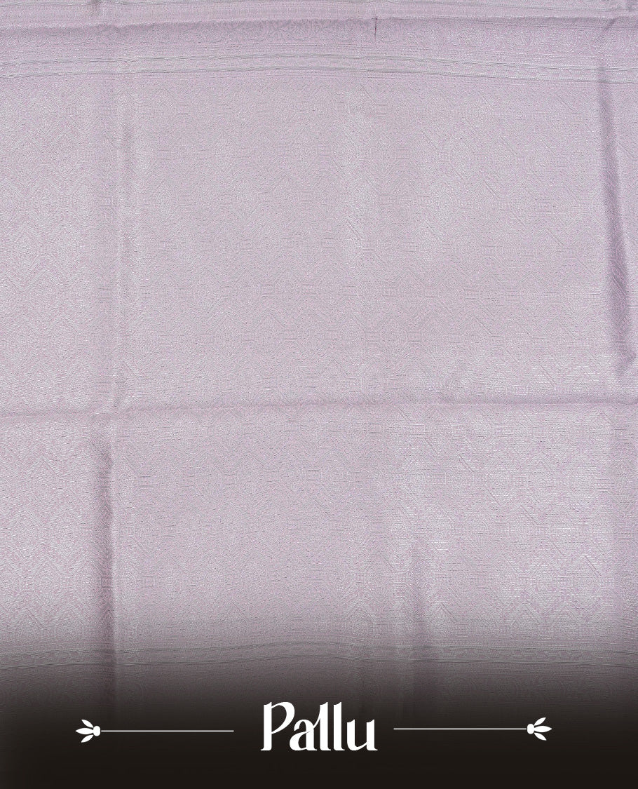 Purple colour semi silk saree featuring Silver zari Floral pattern on body, complemented by contrast Pink colour with silver zari border, comes with matching blouse piece.