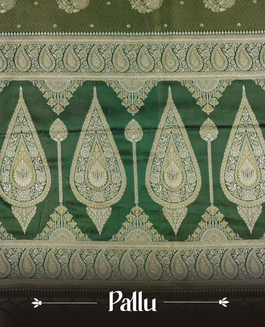 Green colour Mulberry silk saree featuring Gold zari small buttas & floral motifs  on body, complemented by self colour with Gold zari border, comes with matching blouse piece.