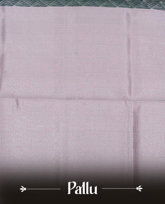 Green colour semi silk saree featuring Silver zari Design pattern on body, complemented by contrast Pink colour with silver zari border, comes with matching blouse piece