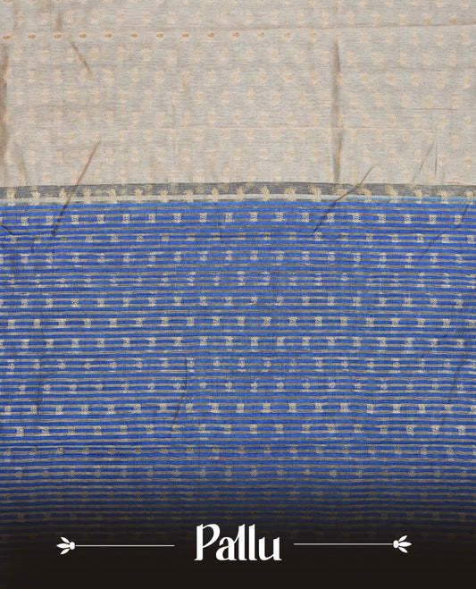 Cream colour Semi Tussar silk saree featuring an Gold zari motifs on body, accentuated by a contrast Blue border adorned with intricate gold zari work, paired with a matching blouse piece.