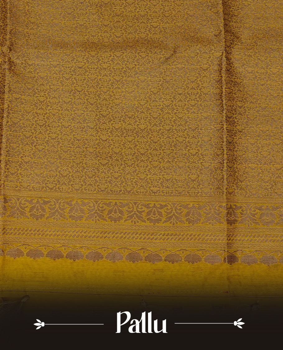 Mustard  yellow colour semi linen saree with elegant gold zari floral motifs across the body, complemented by a contrast color grand pallu and a borderless design, paired with a matching blouse piece.